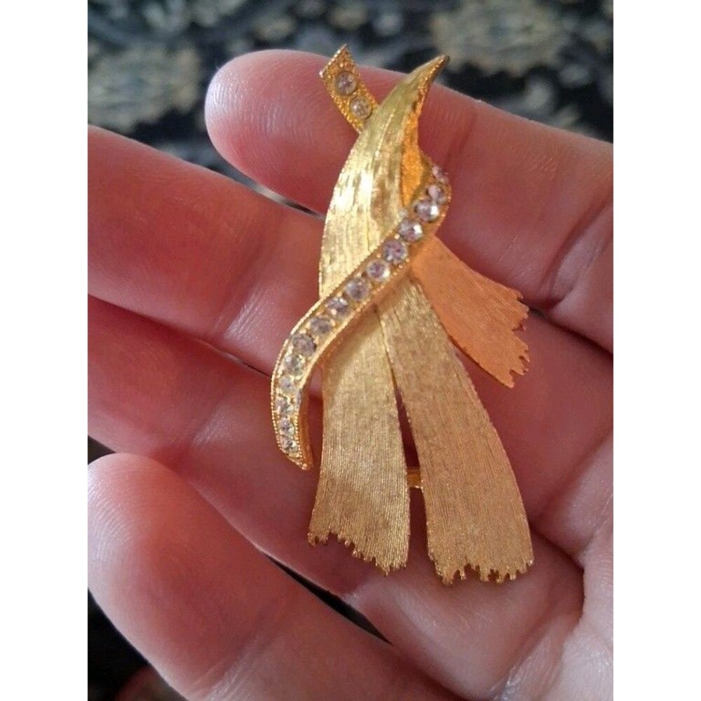 JJ Brooch Gold Tone Rhinestones Geometric Form Ribbon